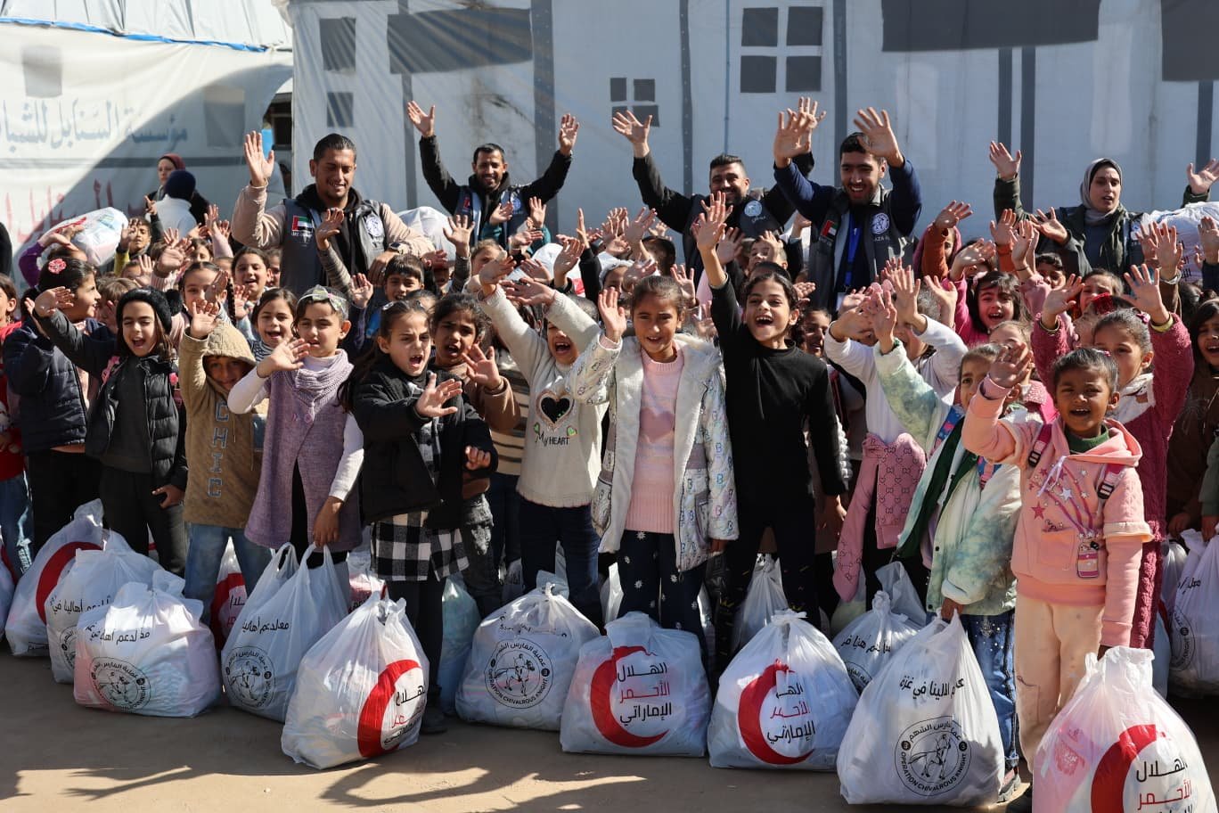Operation Gallant Knight (3) distributes winter clothing to children at Sanabel School